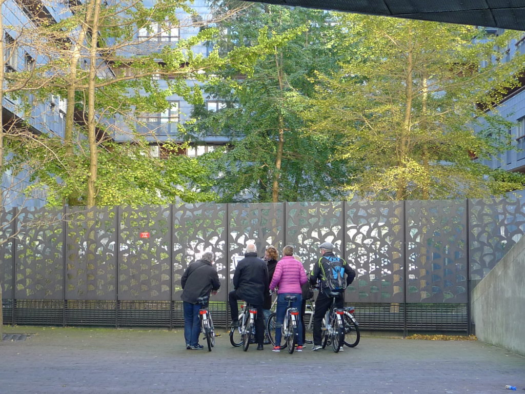 Bike tour group at housing project The Whale in the Eastern Docklands